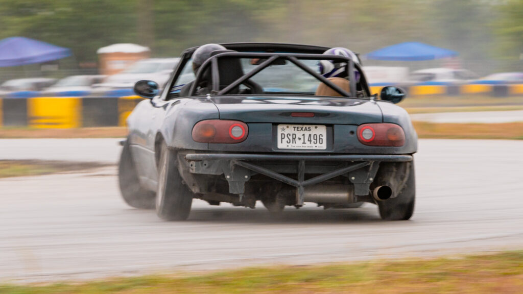 NA Miata Doing spinna wheelies.